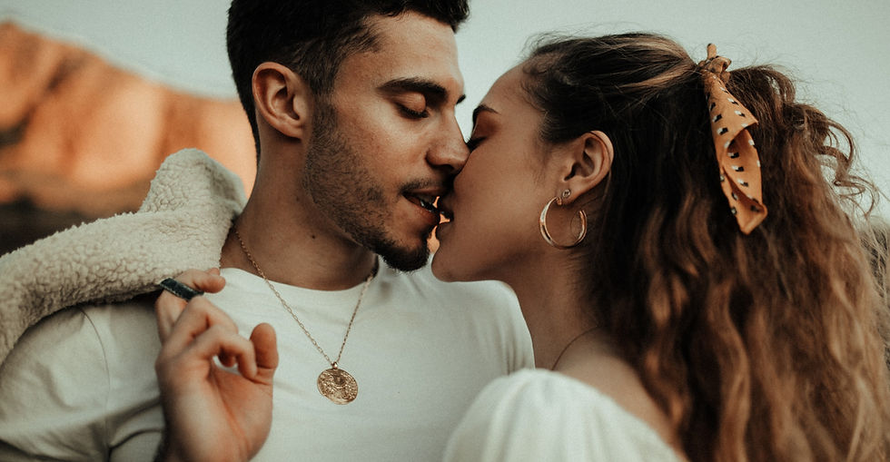 man in white crew neck shirt kissing woman in white crew neck shirt_edited.jpg