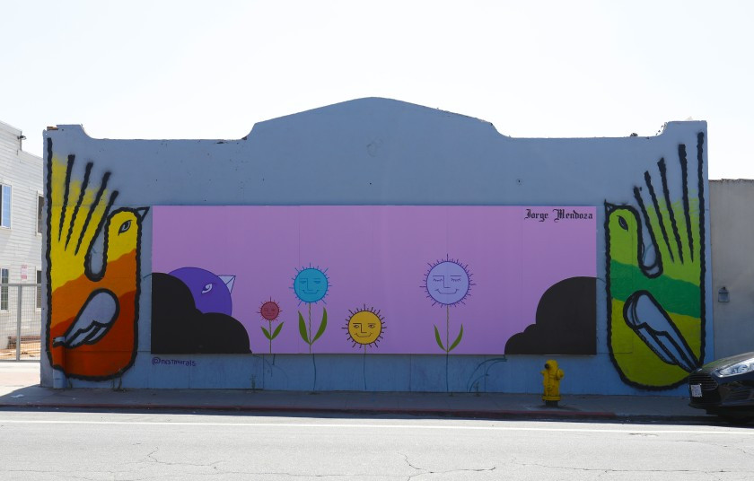 The works are part of the Walls / Murals Cross Border Urban Art binational exhibition made in collaboration with the Municipal Institute of Art and Culture of Tijuana - Photo credit: Nelvin C. Cepeda/The San Diego Union-Tribune