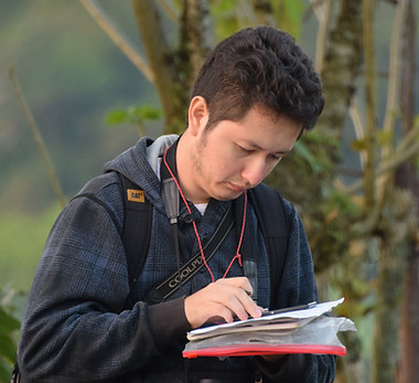 Worker with journal.JPG