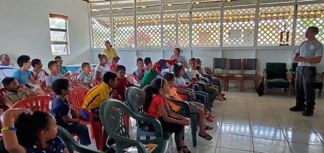 Here at River View school teaching the children about parrot conservation in Guyana