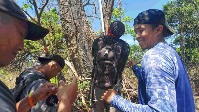 Parakeet Ranger People and Parrots Celebrate Food Abundance Together