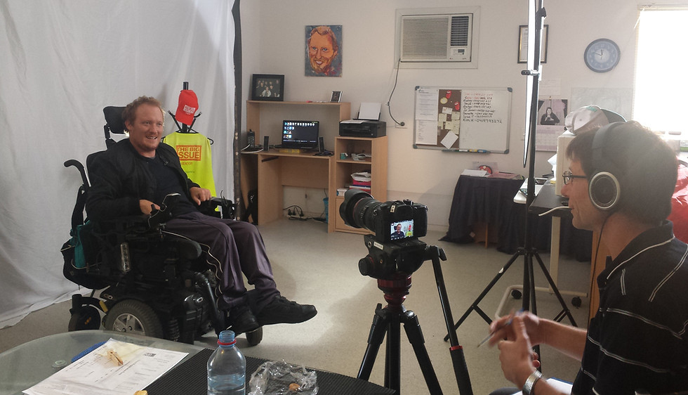 Rob filming Michael for his life story video, demonstrating the listening‑centred approach behind You Tell Videos