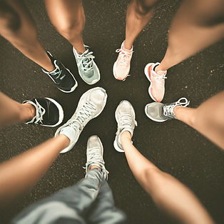 group of runner legs, sneakers, road_edited.jpg