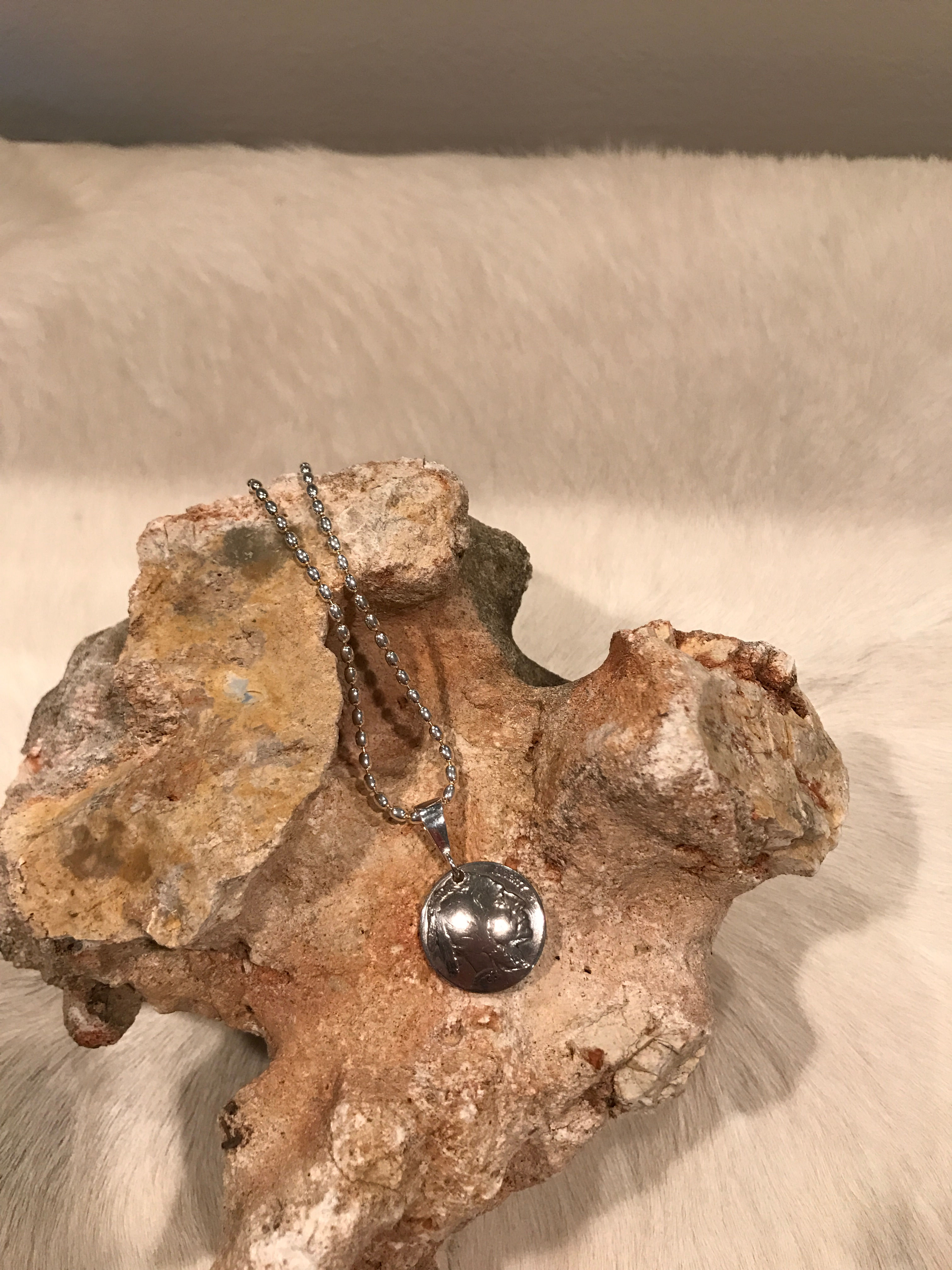 Nickel pendant on 20 in  rice chain