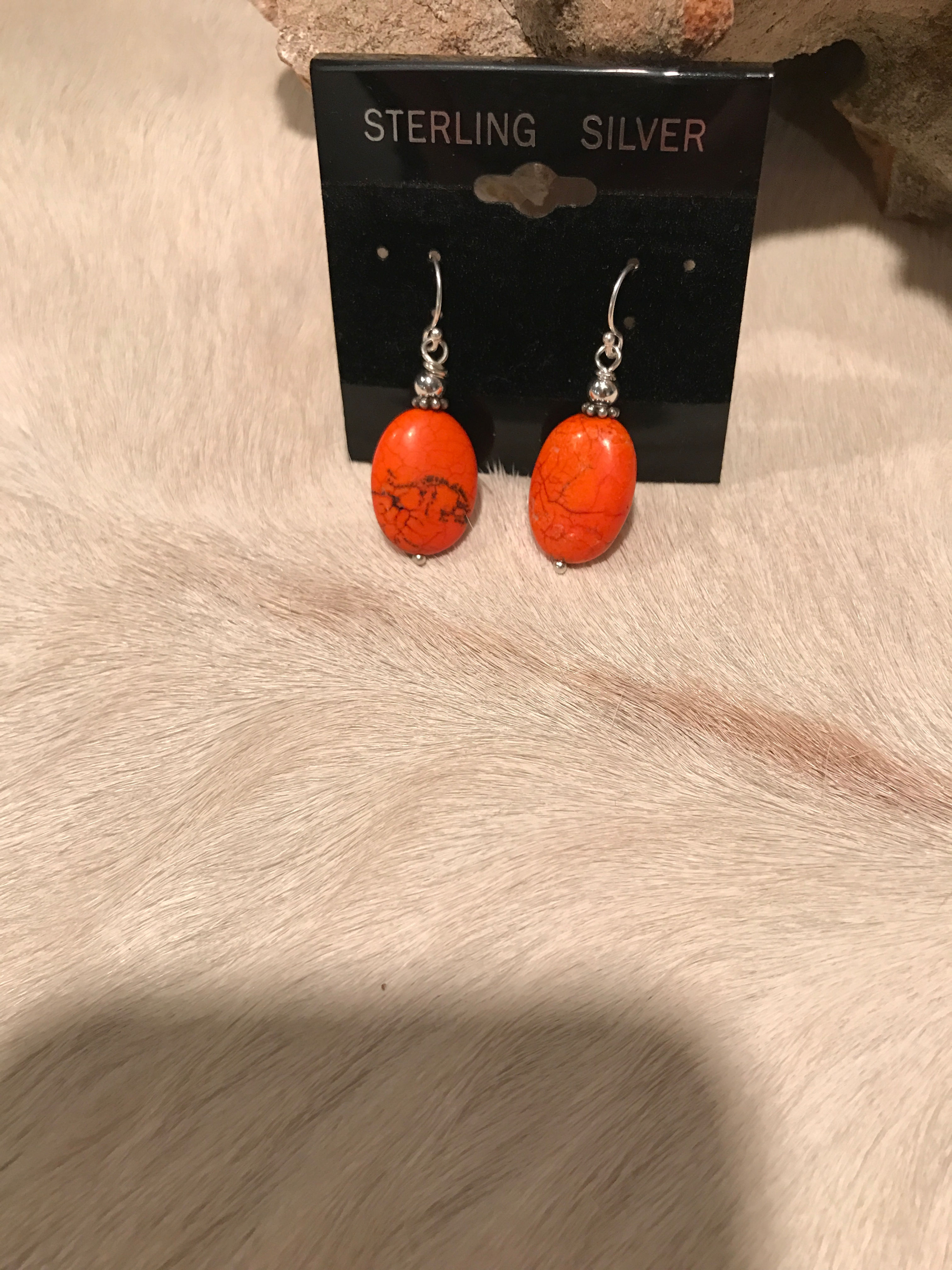 Orange and silver earrings
