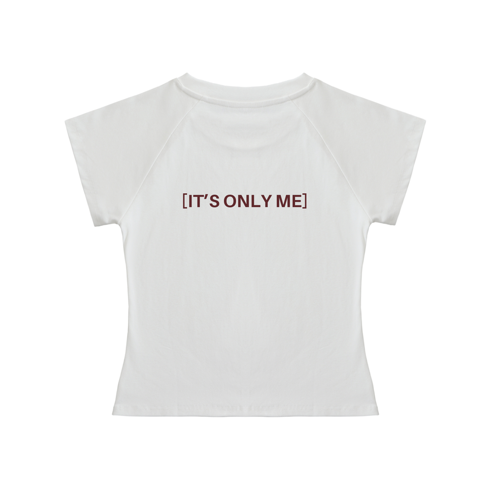 White crop top with front "HEAD OF CREATIVE DEPARTMENT" text, clothing for creatives.