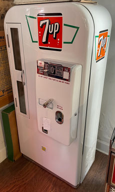Beautifully restored all white 7-up soda vending machine. Gets ice cold, perfect for your game room or man cave