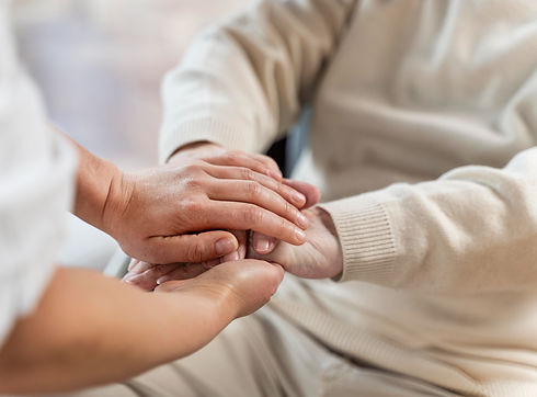 doctor-holding-hands-with-senior-patient_edited.jpg