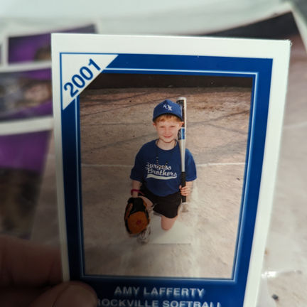 A handsome young boy with a softball uniform from 2001