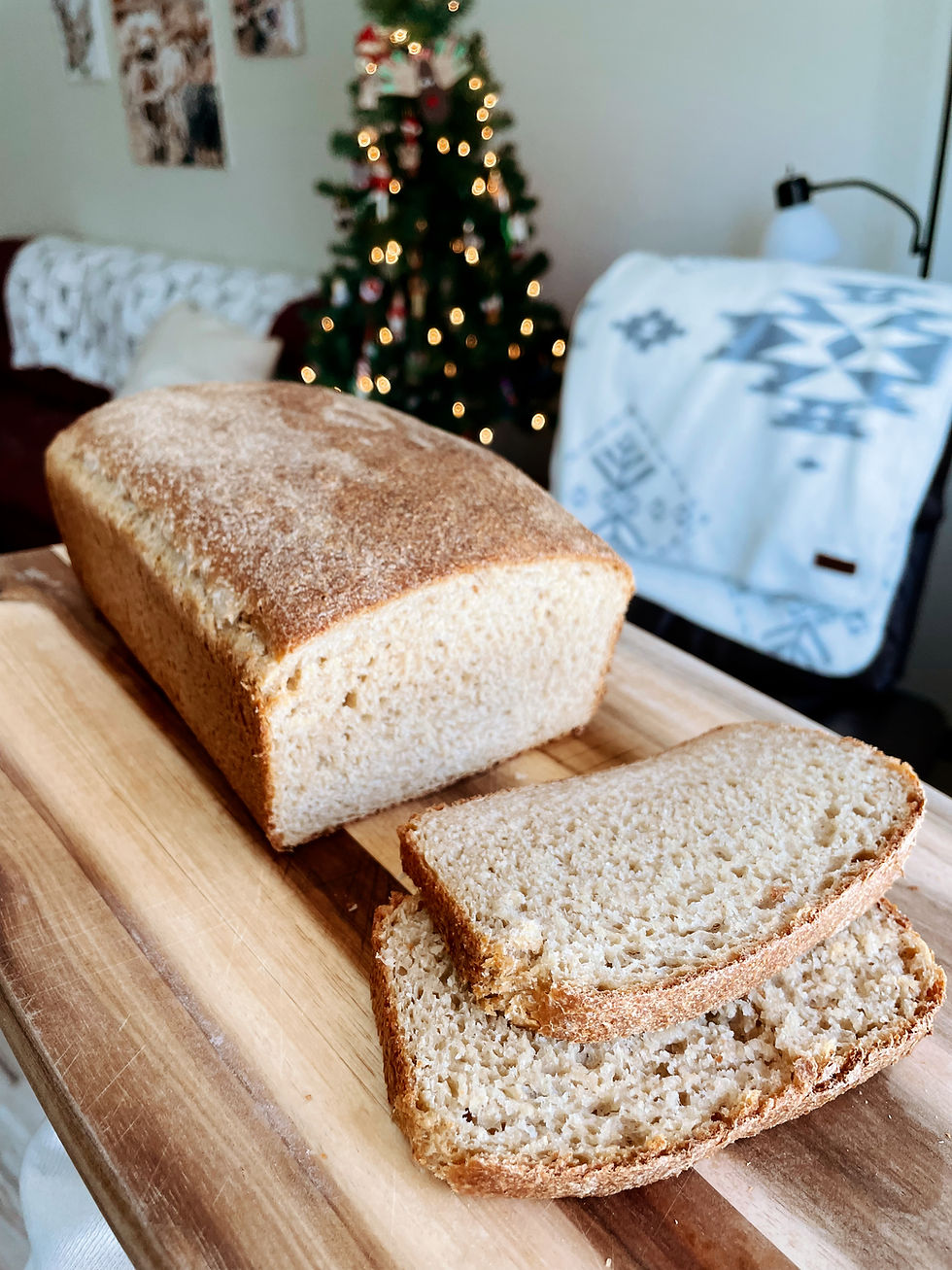 Sourdough Sandwich Bread with Freshly Milled Whole Wheat Flour on wooden serving tray