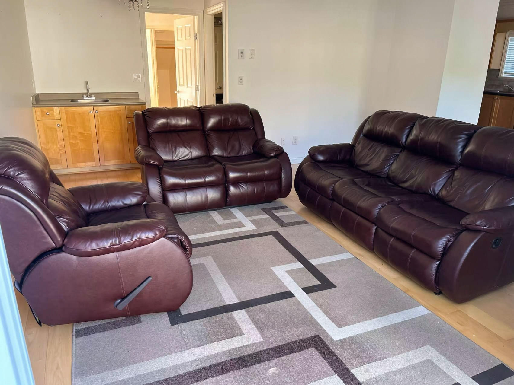 Ashley Genuine Leather Reclining Sofa Set – Like New