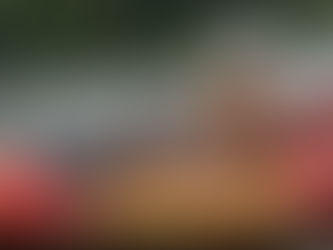 woman using an adaptive kayaking paddle on water