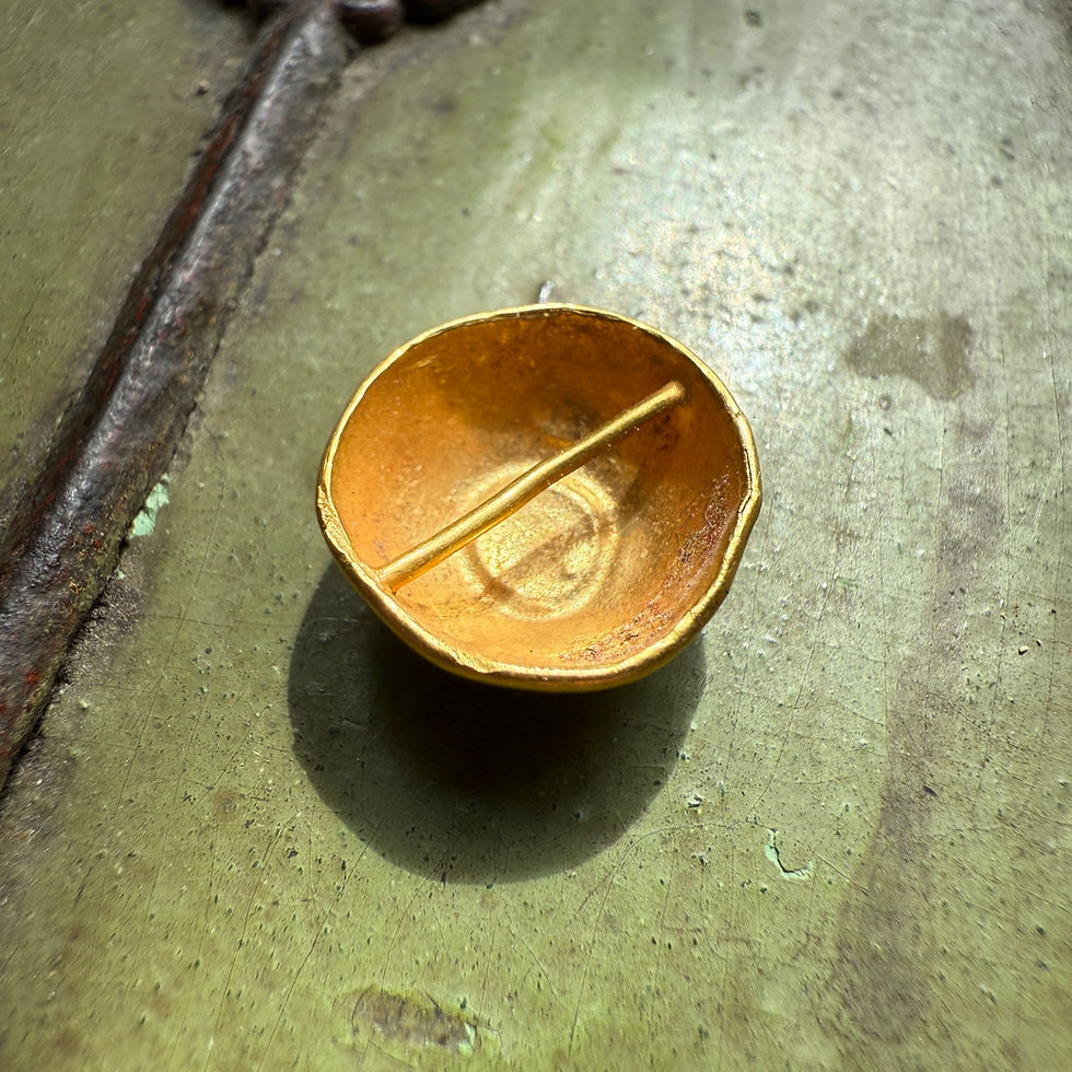 Thumbnail: Domed gold button set with a green glass cabochon.  Anglo-Saxon, 7th century AD.