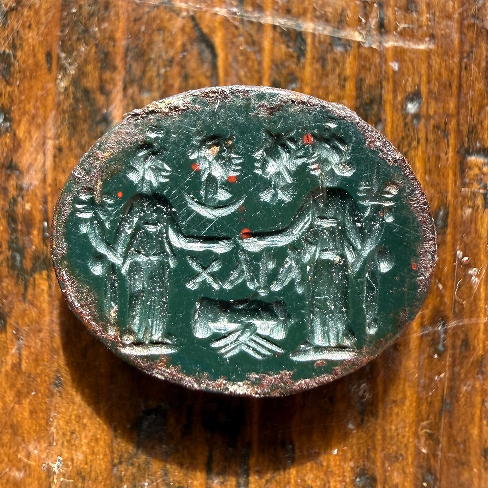 Thumbnail: Bloodstone (heliotrope) intaglio: marriage scene.  Roman, 2nd–3rd century A.D.