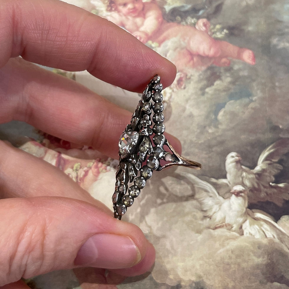 Thumbnail: Rose cut diamond ring decorated with an allegory of love. French, 18th century.