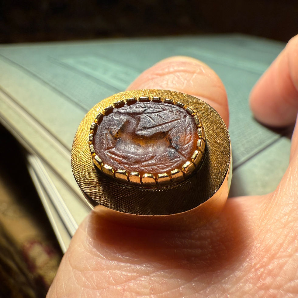 Thumbnail: Gold Ring Set with an Ancient Carnelian Scarab Depicting a Deer Hunt.