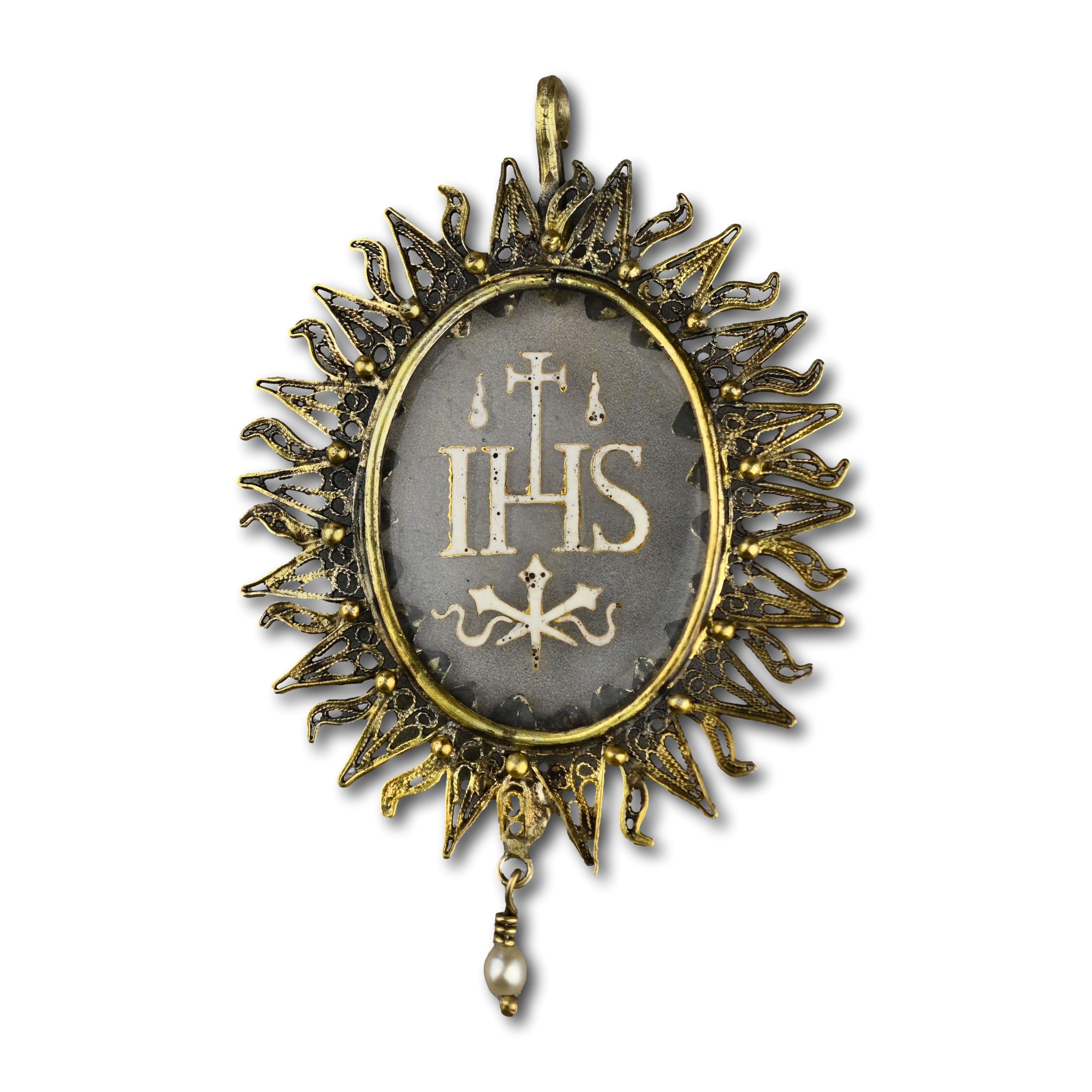 Silver gilt pendant with an enamelled glass ’IHS’. Spanish, mid 17th century.