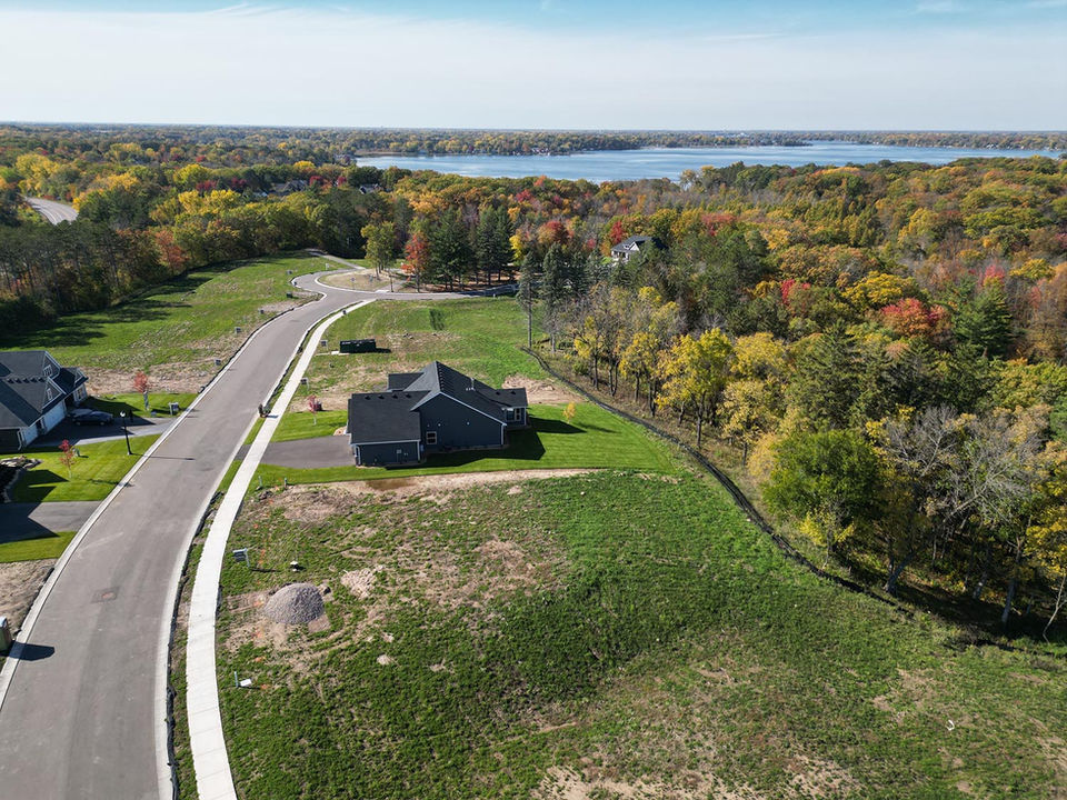 Aerial view of homes and neighborhood streets in Forest Hills Preserve near Forest Lake MN.