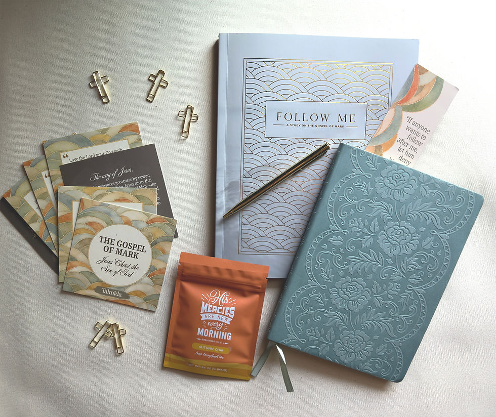 Mark study guide with journal, pen, bookmark, and cross clip.