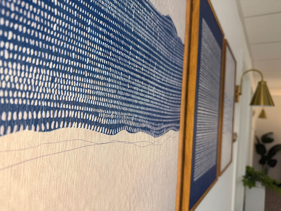 Close Up of Framed Artwork on Wall