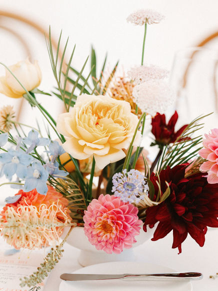 colorful centerpiece for a long reception table