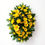 Thumbnail: A bright and vibrant yellow funeral spray arranged in an oval shape, perfect for the top of a casket, or as a tribute.