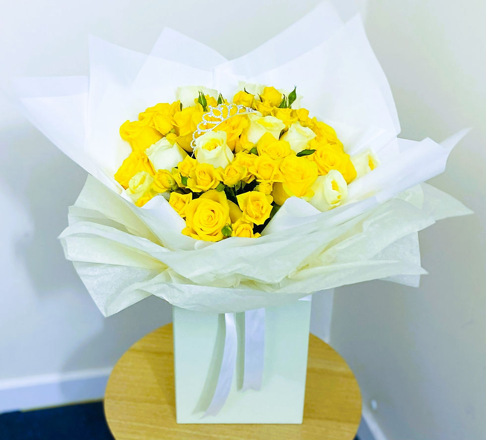 The Royal Duchess Bouquet - A sumptuous arrangement of golden yellow roses, creating a rich, glowing palette.