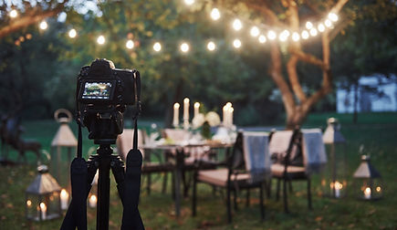 vecteezy_camera-on-the-tripod-stand-in-the-field-in-front-of-prepared_4031574.jpg