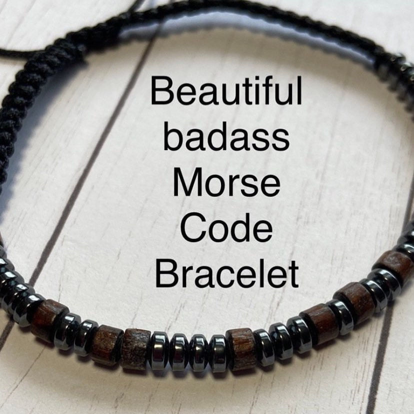 Morse Code bracelet that reads "Beautiful Badass" with wooden and metal beads