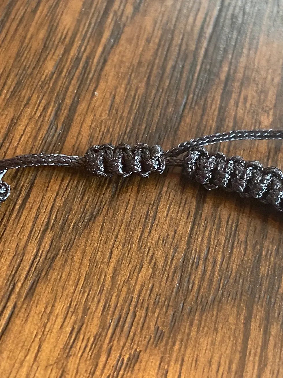 Thumbnail: close up of knot for  fuck off morse code bracelet
