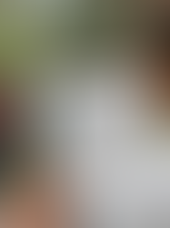 A community member using a digital booklet to support a community trauma healing workshop.