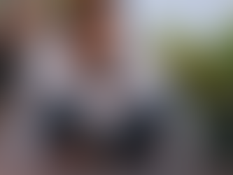 Woman with hands on chest