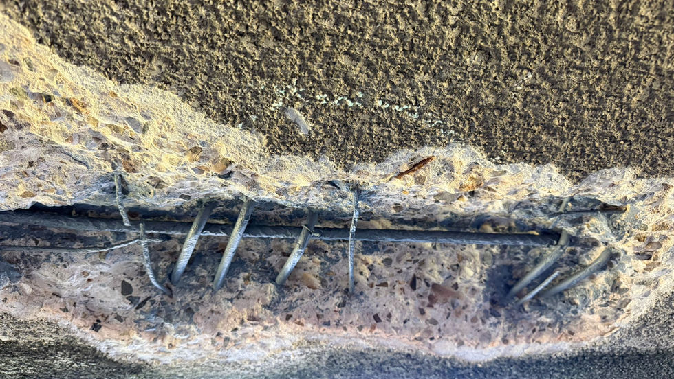 Priming Steel Reinforcement with Zinc Primer for Concrete Repair