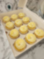 Lemon Cupcakes topped with a lemon buttercream swirl.