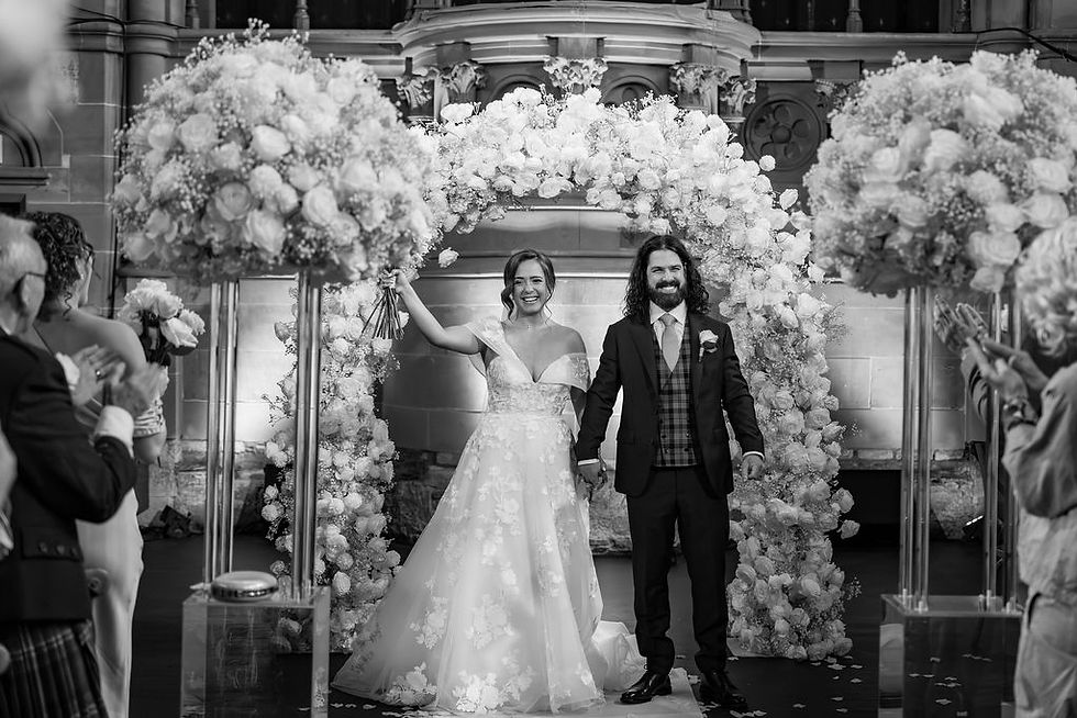 Bride and groom just announced as husband and wife during their ceremony at Cottiers in Scotland.