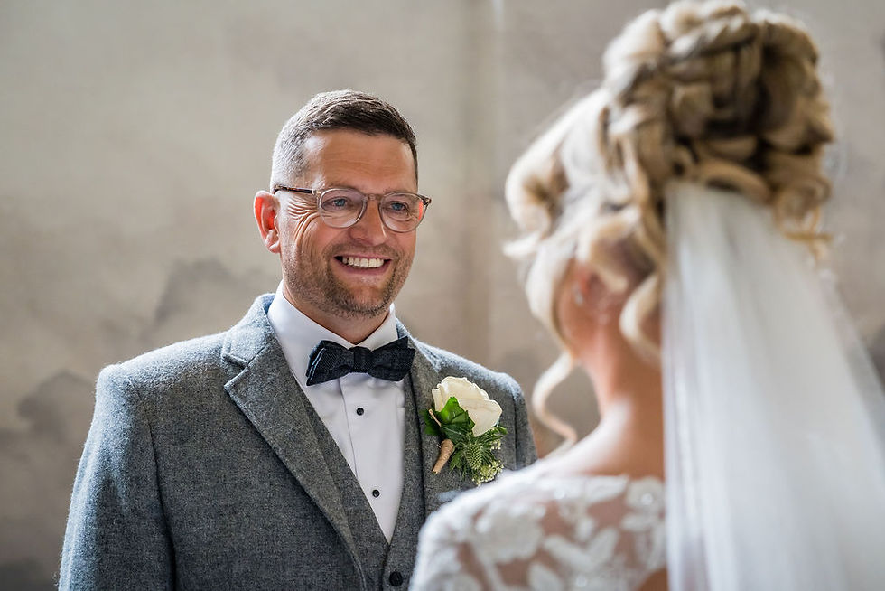 Groom portrait during wedding at Balbirnie House in Scotland, relaxed candid moment before reception