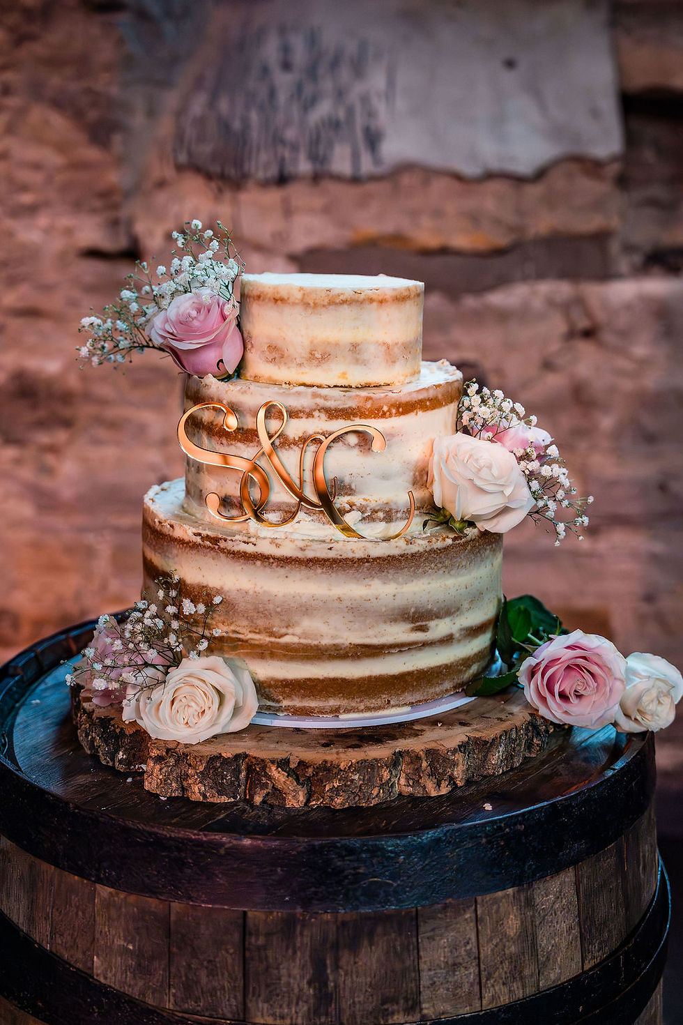 Wedding cake displayed during the reception at Cottiers, captured as part of the day’s details