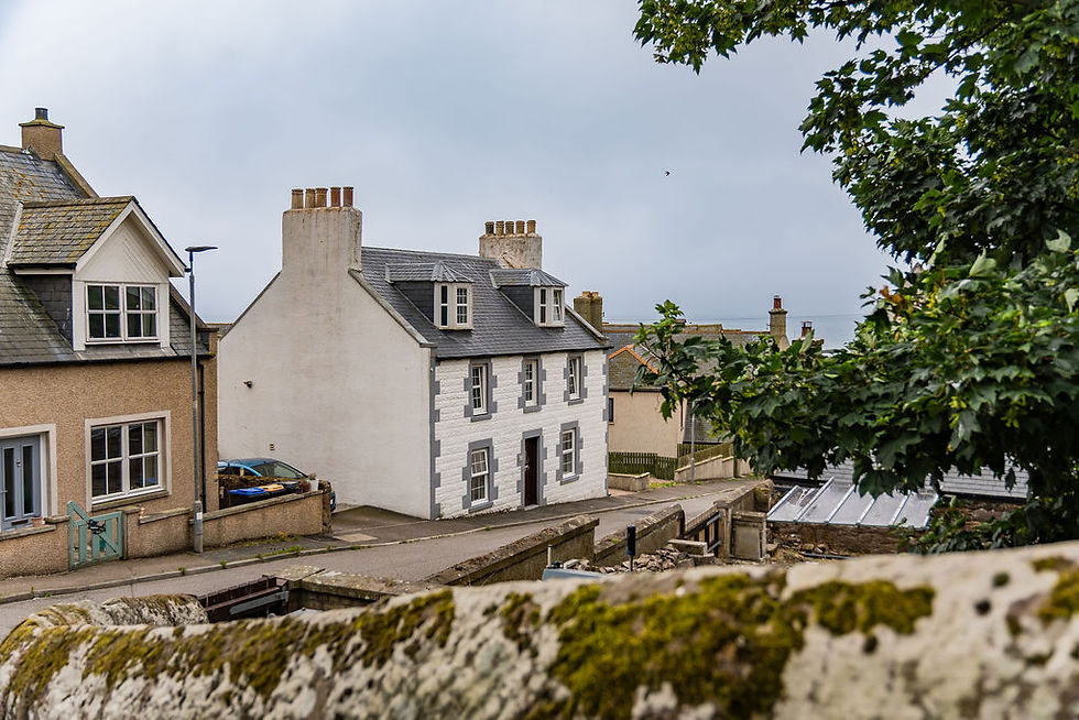Bride getting ready inside her Airbnb before the wedding ceremony, with a calm morning atmosphere in Scotland.