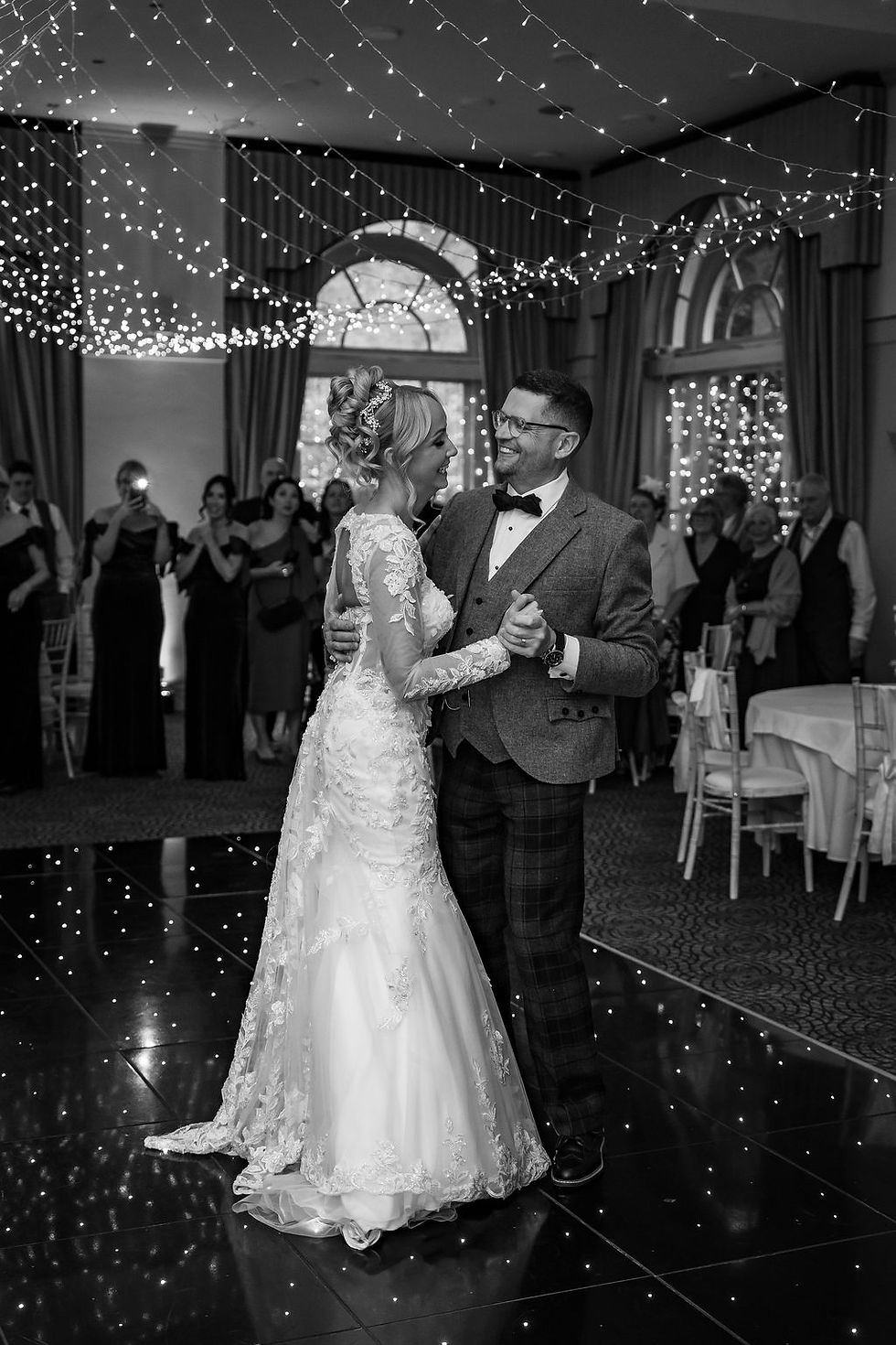 Bride and groom sharing their first dance together during the evening reception at Balbirnie House.
