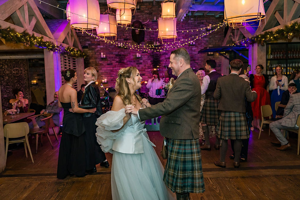 Bride and groom sharing their first dance at their Dundee wedding reception.
