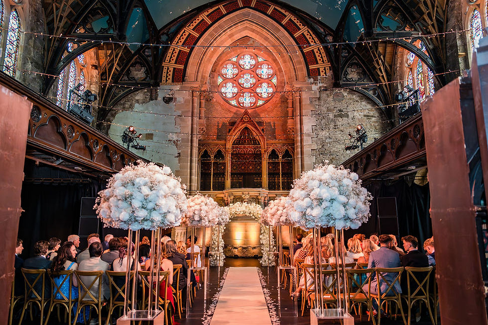 Interior of Cottiers before the ceremony begins, with guests waiting inside the wedding venue