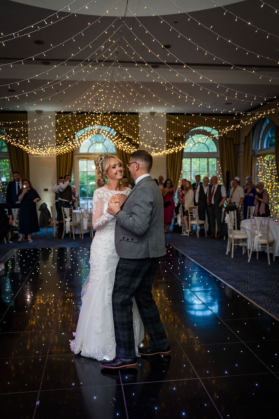Bride and groom sharing romantic first dance at Balbirnie House wedding reception in Scotland