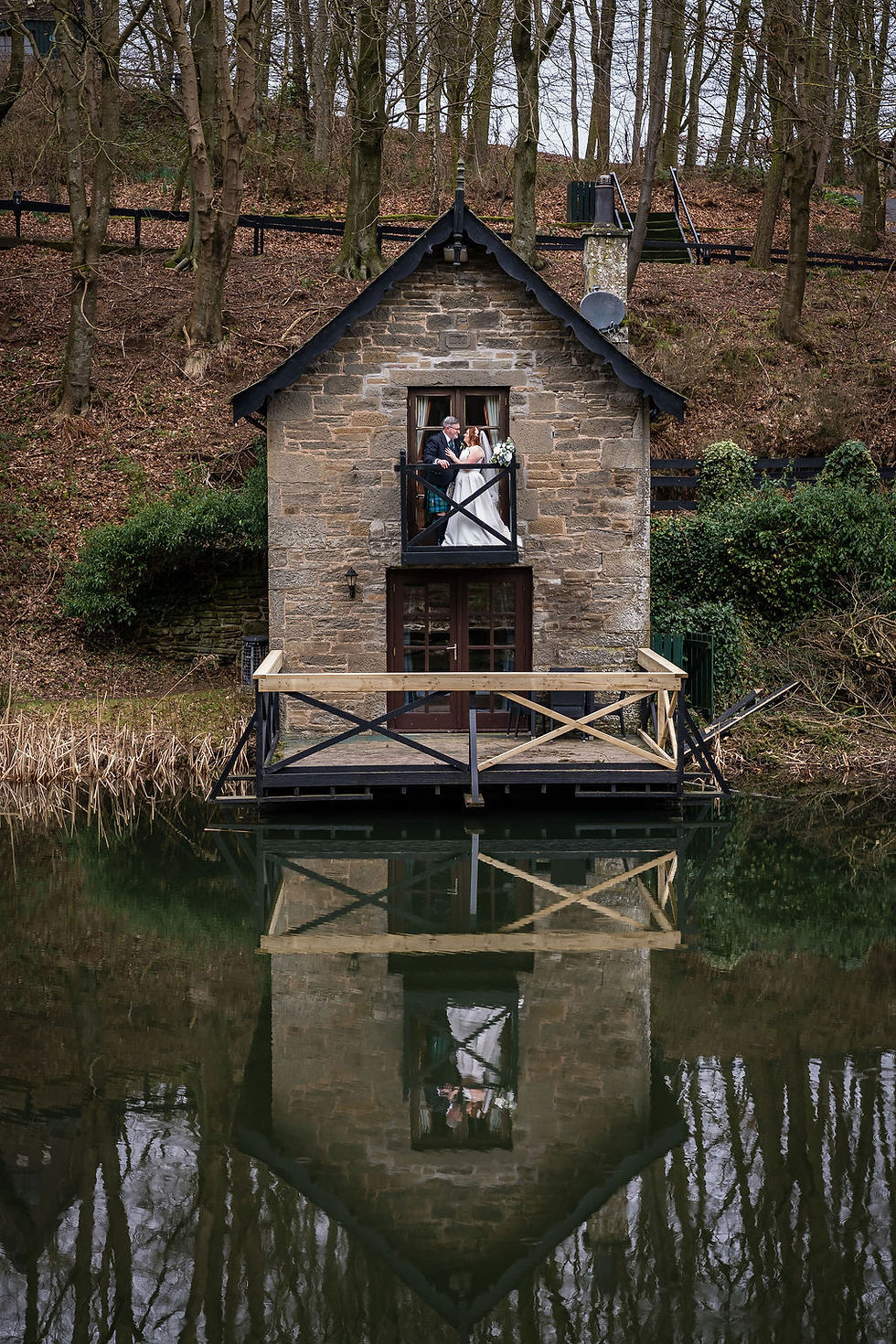 Bride and groom sharing a quiet moment during their wedding portraits at Forbes of Kingennie venue near Dundee in Angus, Scotland.