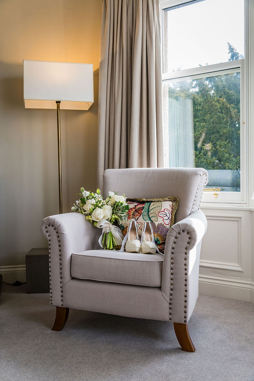 Elegant wedding details styled at Kinclune House including rings and accessories, photographed in natural light in Angus
