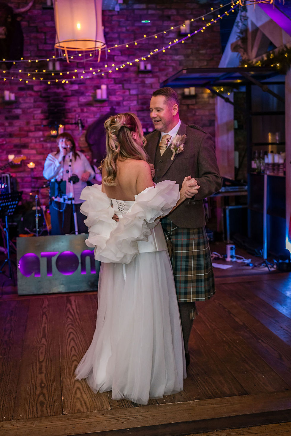 Bride and groom’s first dance during their winter wedding at Forgan’s Broughty Ferry.