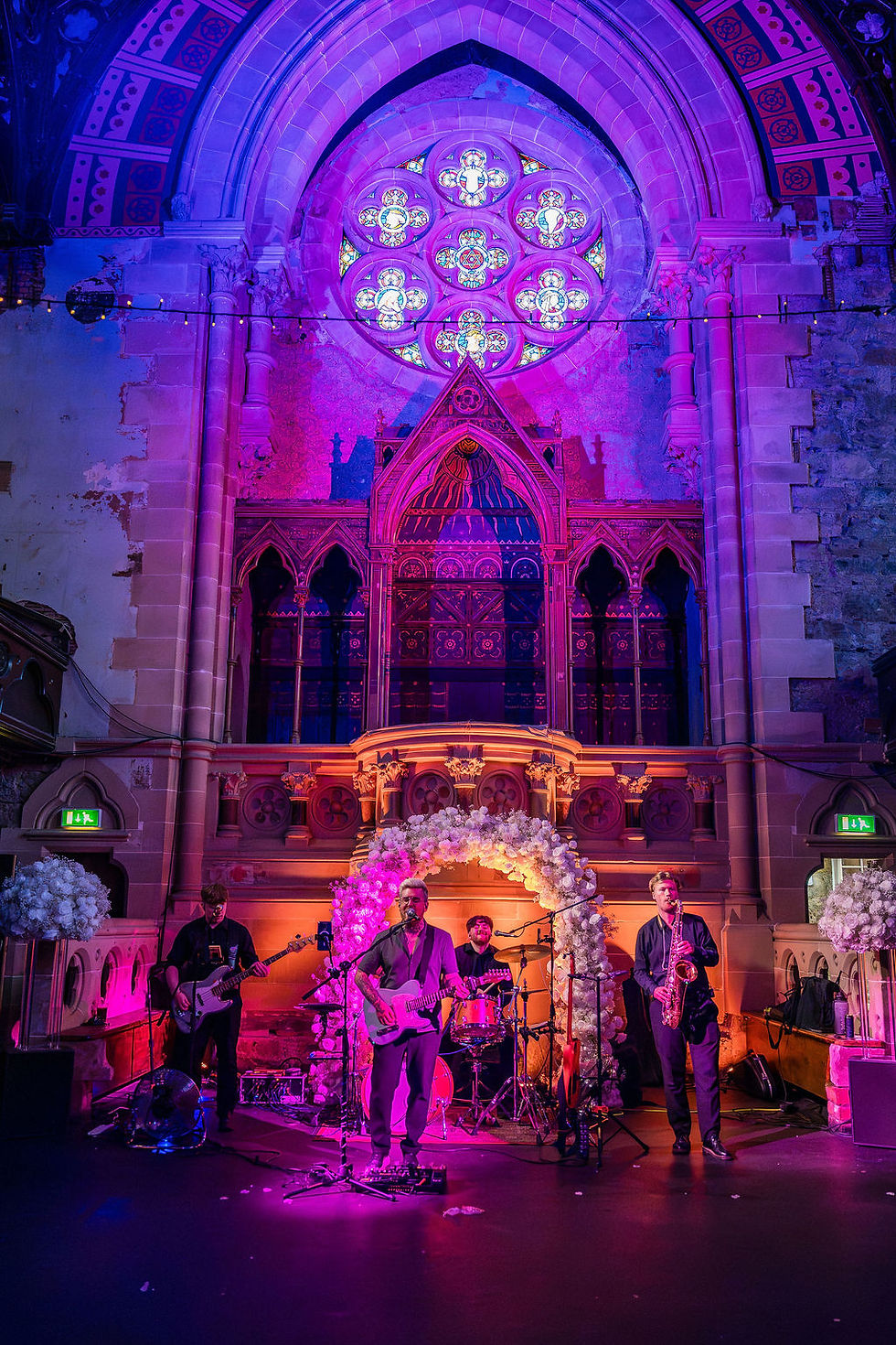 Live band performing during the wedding reception at Cottiers, creating a lively evening atmosphere