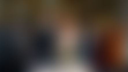 Bride and groom cutting their wedding cake during the reception at Balbirnie House in Fife, captured by a documentary Scottish wedding photographer.