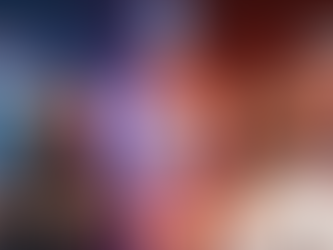 JT and Cardi B standing on opposite sides of a boxing ring, glaring at each other, representing their rap beef.