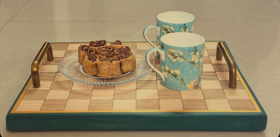 Food props on Hand made wooden serving tray with golden handles with golden and brown borders. A matching set of 2 wooden coasters. By The Gulmohar Studio