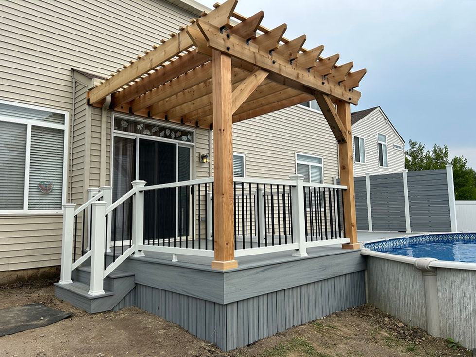 Trex composite decking and railing with cedar pergola in Lockport, IL.jpg
